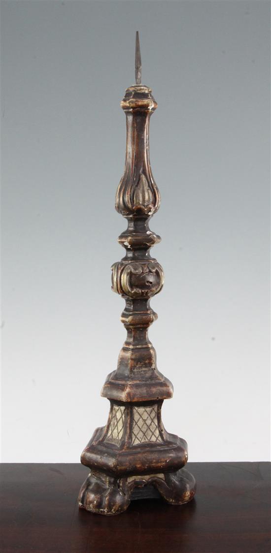 An 18th century Italian carved wood and gesso pricket candlestick, 18.75in.